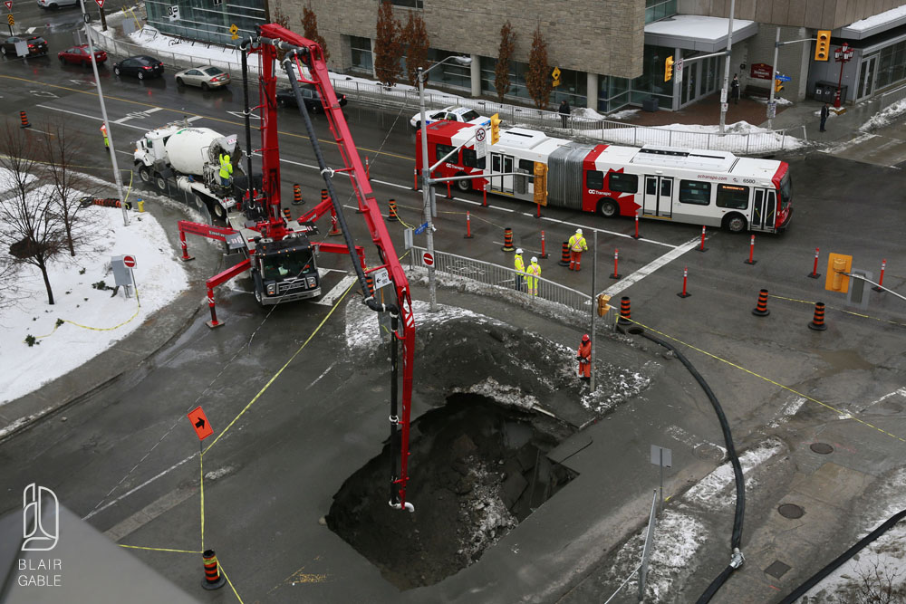 A sinkhole at Laurier Ave E and Waller Street in Ottawa