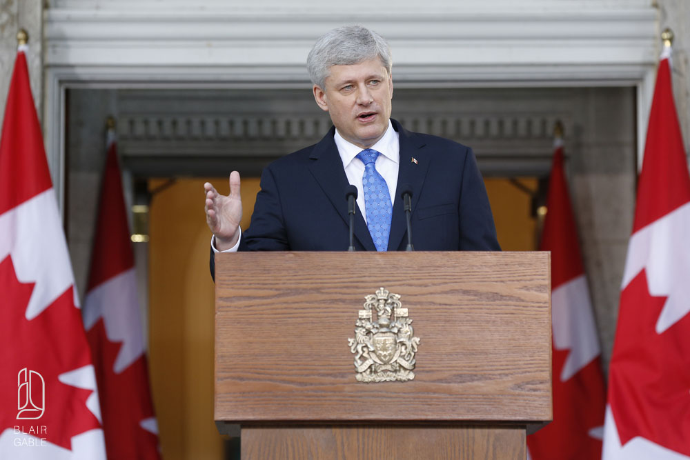 Canada's PM Harper takes part in a news conference at Rideau Hall after asking GG Johnston to dissolve Parliament, beginning the longest federal election campaign in recent history, in Ottawa