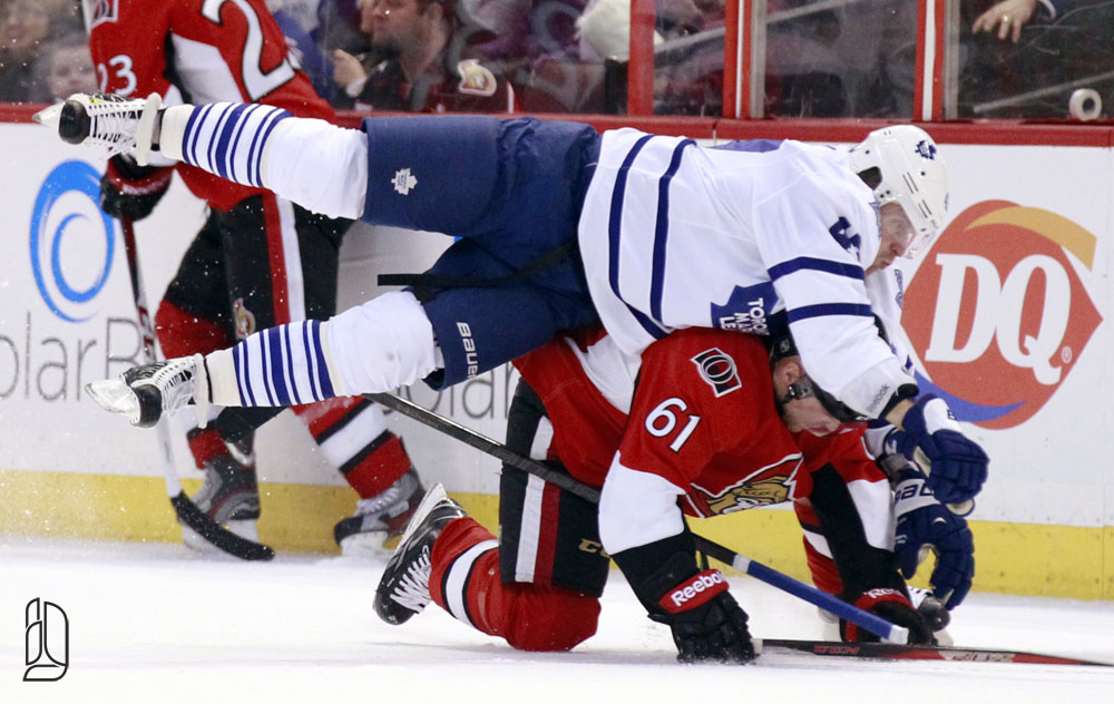Toronto Maple Leafs' Komarov hits Ottawa Senators' Benoit